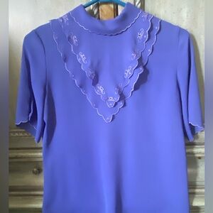 Vibrant purple short sleeve blouse w/ scallop details on sleeves, bib & collar